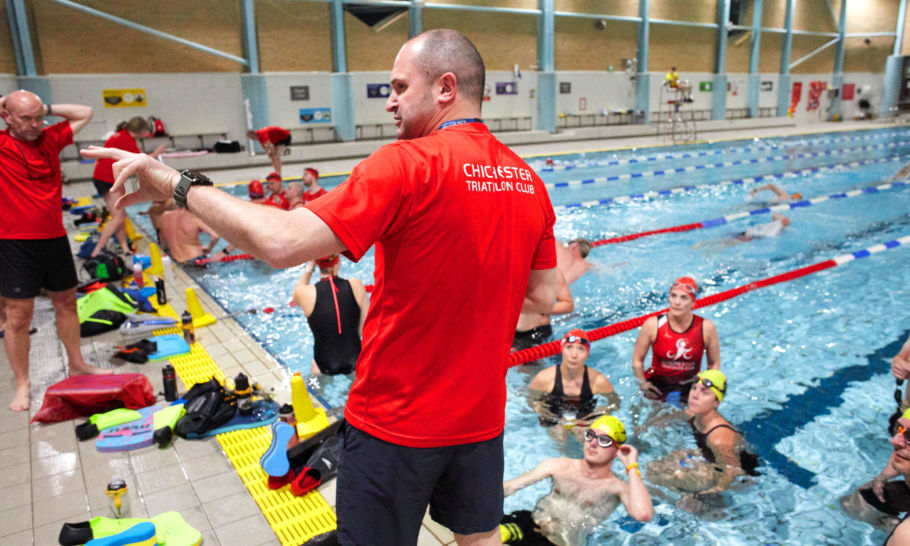 Chichester Triathlon Club coach leading a swim training session in 33m pool