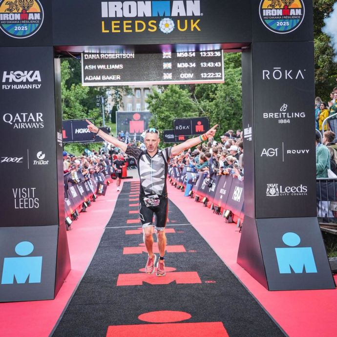 Chi Tri member crosses the finishing line at Ironman Leeds 2025